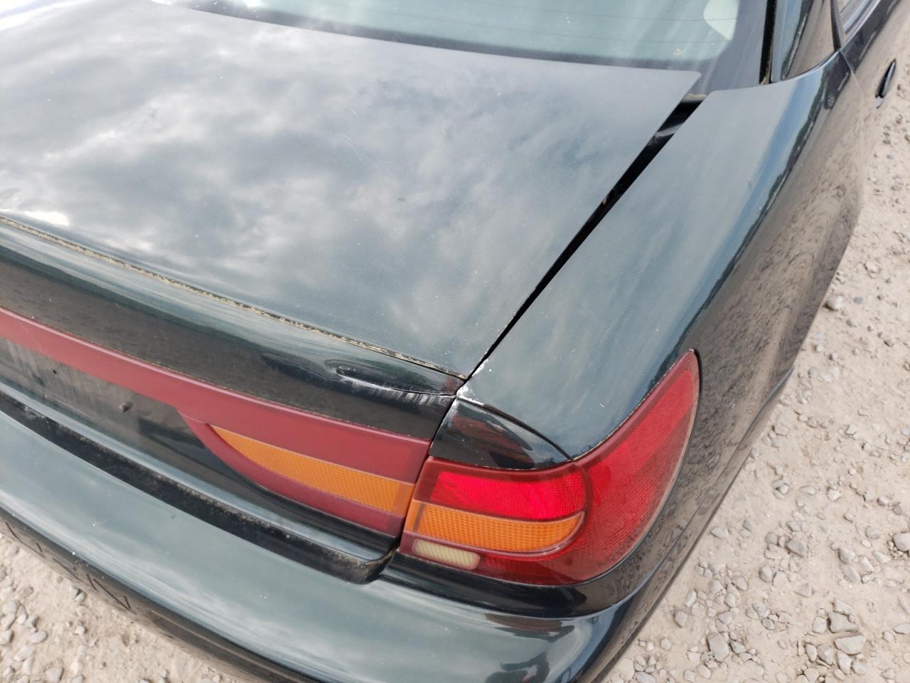 Photo 20 from auction – 2001 SATURN SL2 with VIN 1G8ZK52721Z296395