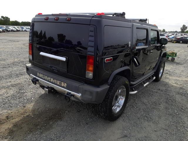 Photo 4 from auction – 2003 HUMMER H2 with VIN 5GRGN23U73H140951