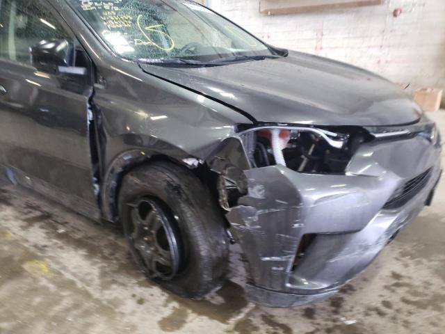 Photo 9 from auction – 2018 TOYOTA RAV4 LE with VIN JTMBFREV2JJ231638