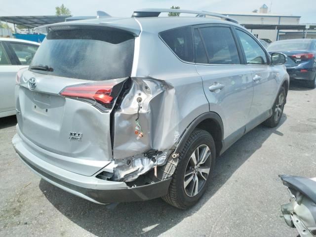 Photo 4 from auction – 2017 TOYOTA RAV4 XLE with VIN 2T3RFREV3HW557586