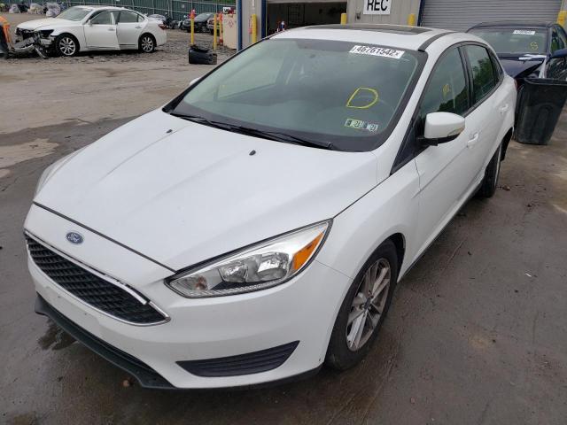 Photo 2 from auction – 2015 FORD FOCUS SE with VIN 1FADP3F27FL285493