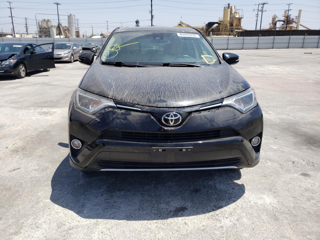 Photo 9 from auction – 2017 TOYOTA RAV4 XLE with VIN 2T3WFREV6HW384441