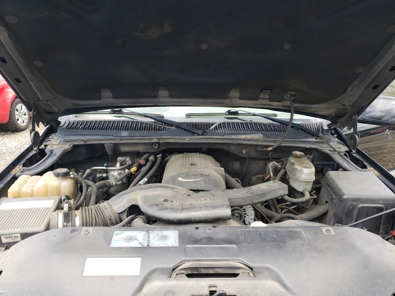 Photo 12 from auction – 2004 GMC YUKON with VIN 1GKEC13Z04R142710