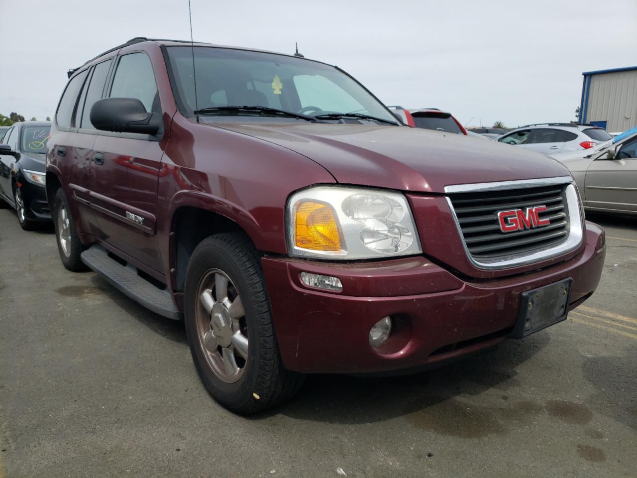 Photo 14 from auction – 2005 GMC ENVOY with VIN 1GKDT13S952100920