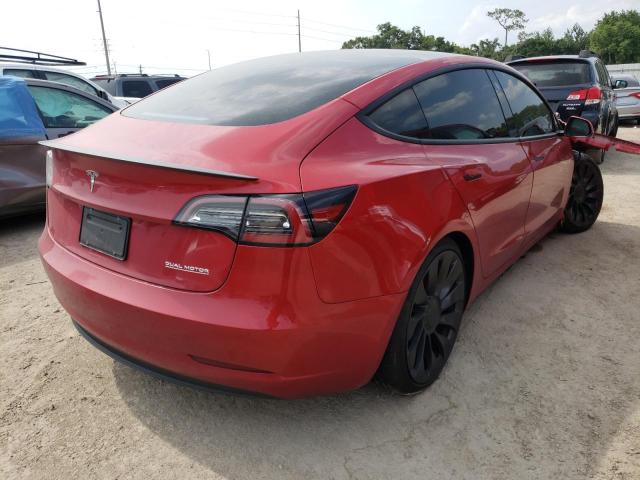 Photo 4 from auction – 2022 TESLA MODEL 3 with VIN 5YJ3E1EC2NF104778