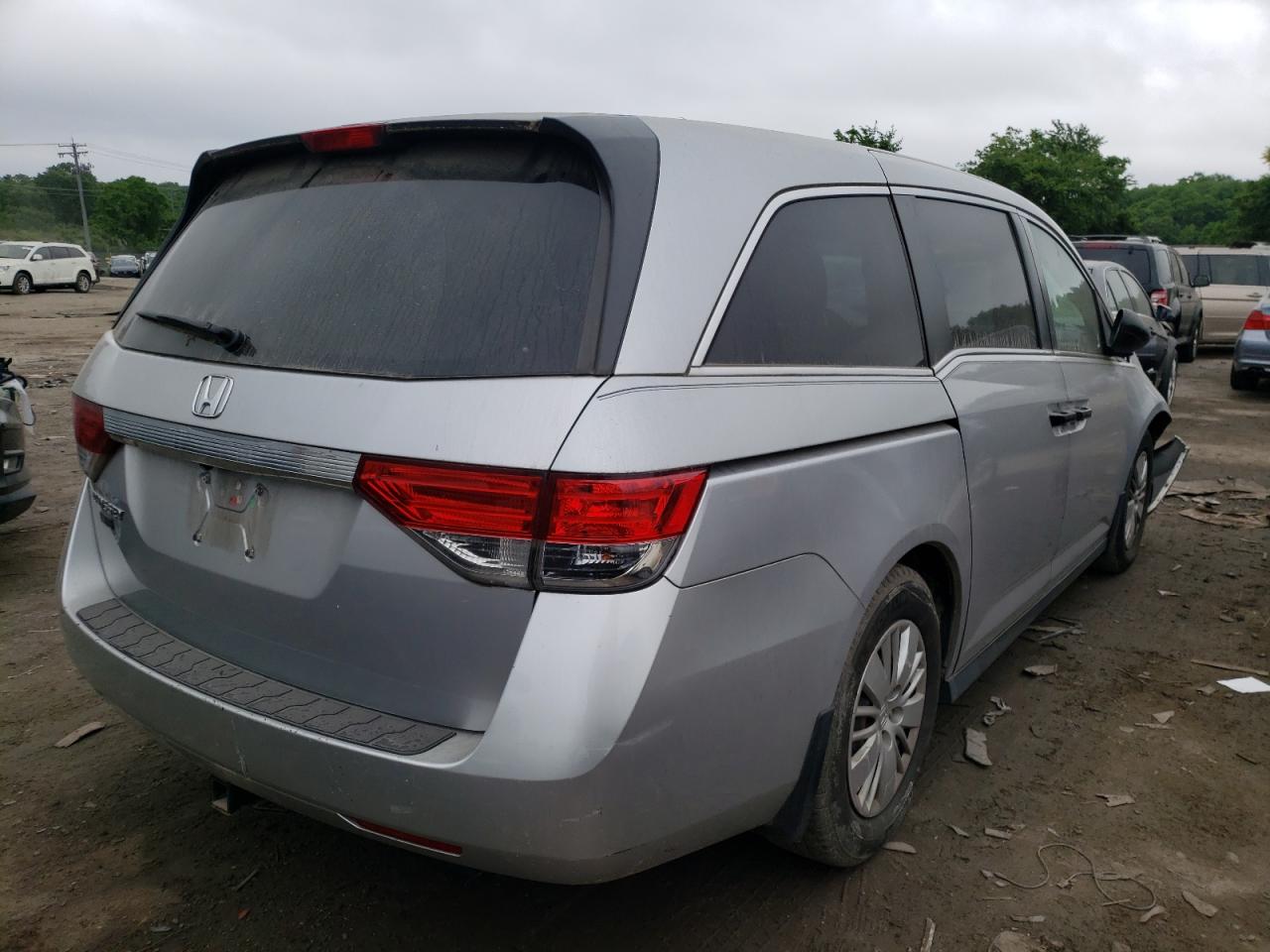 Photo 17 from auction – 2014 HONDA ODYSSEY LX with VIN 5FNRL5H23EB007048