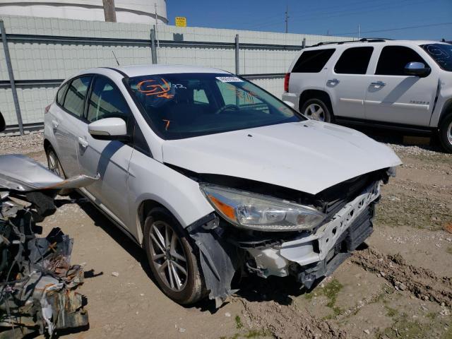 FORD FOCUS SE 2015 with VIN 1FADP3K26FL254323 - Photo from auction