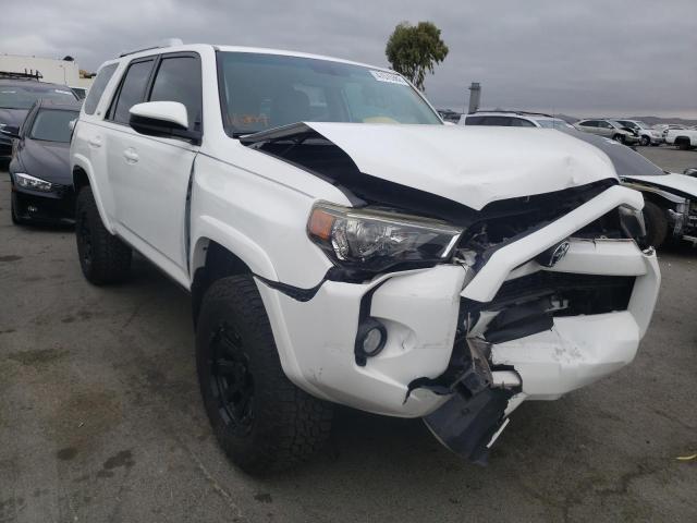 TOYOTA 4RUNNER SR 2014 with VIN JTEZU5JRXE5069628 - Photo from auction
