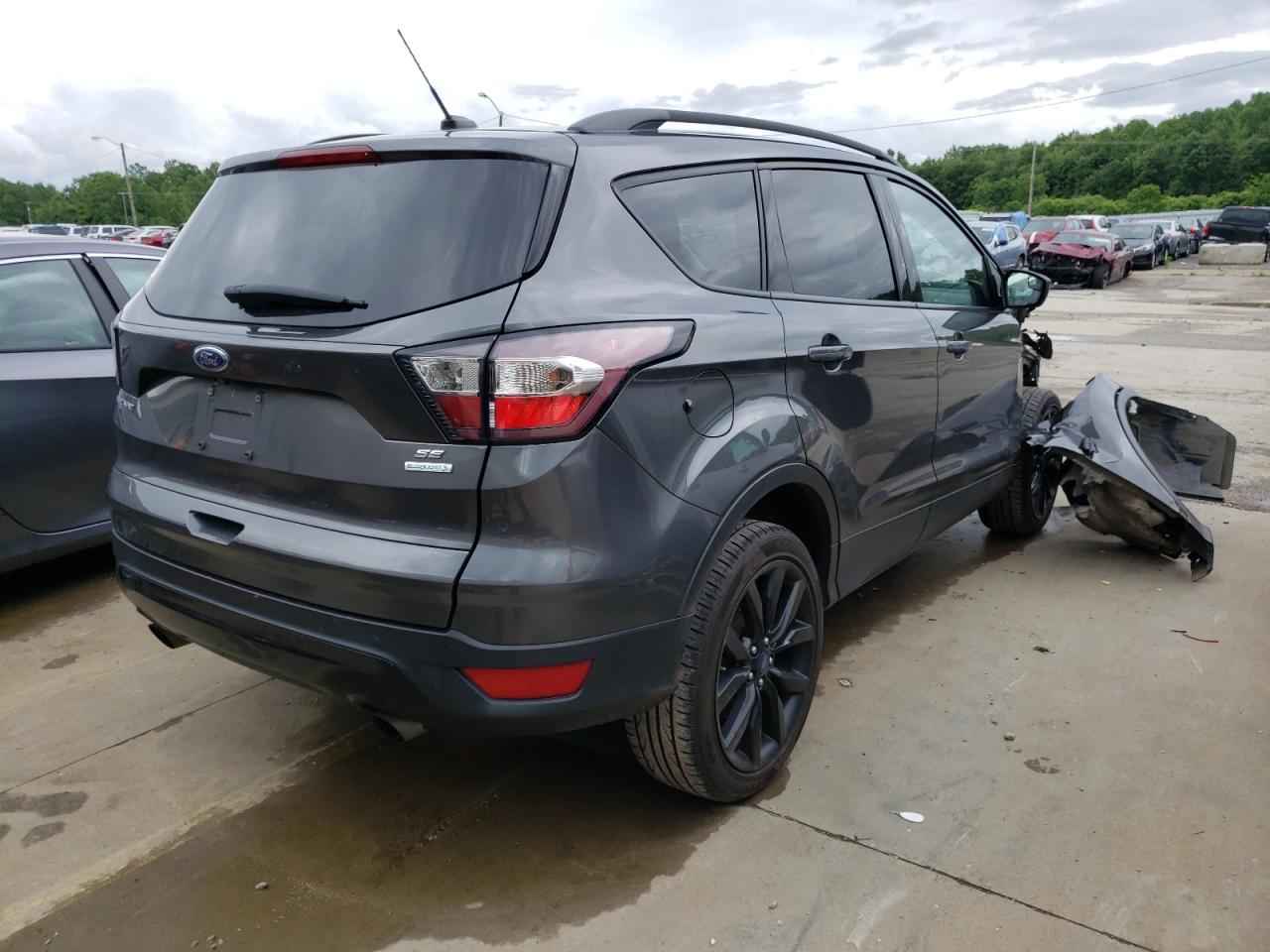 Photo 16 from auction – 2017 FORD ESCAPE SE with VIN 1FMCU0G99HUB87440
