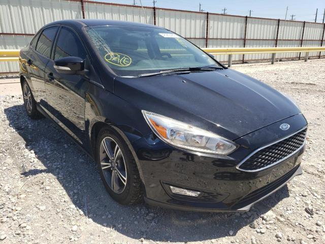 Photo 4 from auction – 2016 FORD FOCUS SE with VIN 1FADP3FE5GL257896