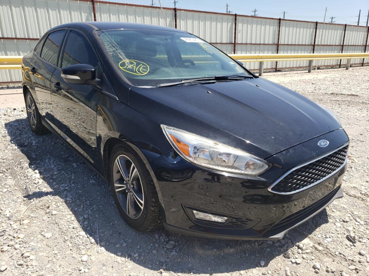 Photo 14 from auction – 2016 FORD FOCUS SE with VIN 1FADP3FE5GL257896