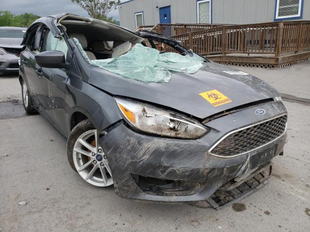 FORD FOCUS SE 2018 with VIN 1FADP3K28JL225348 - Photo from auction