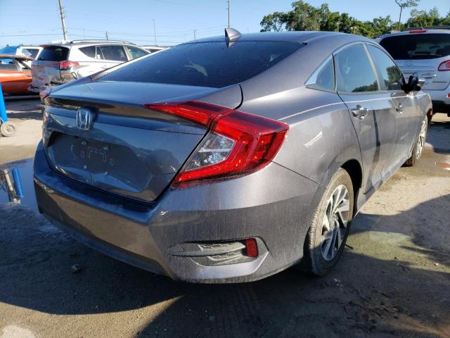 Photo 4 from auction – 2018 HONDA CIVIC EX with VIN 19XFC2F79JE024999