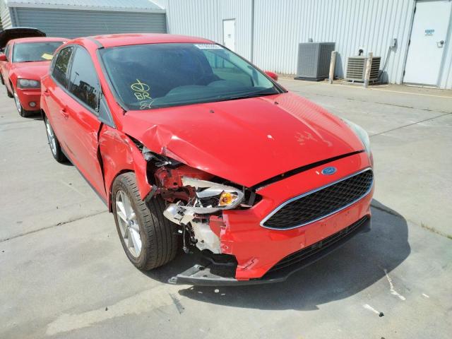 FORD FOCUS SE 2015 with VIN 1FADP3K27GL272220 - Photo from auction
