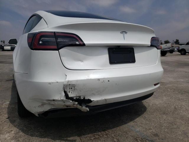 Photo 9 from auction – 2021 TESLA MODEL 3 with VIN 5YJ3E1EA6MF868419