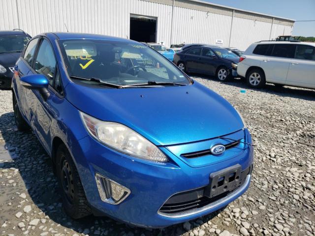 FORD FIESTA SES 2011 with VIN 3FADP4FJ3BM131935 - Photo from auction