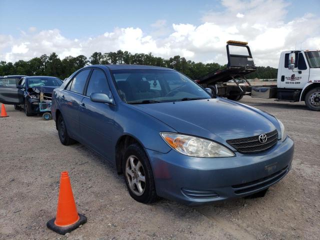 TOYOTA CAMRY LE 2002 with VIN JTDBE32K420015937 - Photo from auction
