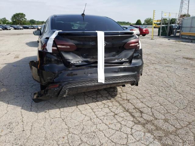 Photo 9 from auction – 2015 FORD FOCUS SE with VIN 1FADP3F23FL268559