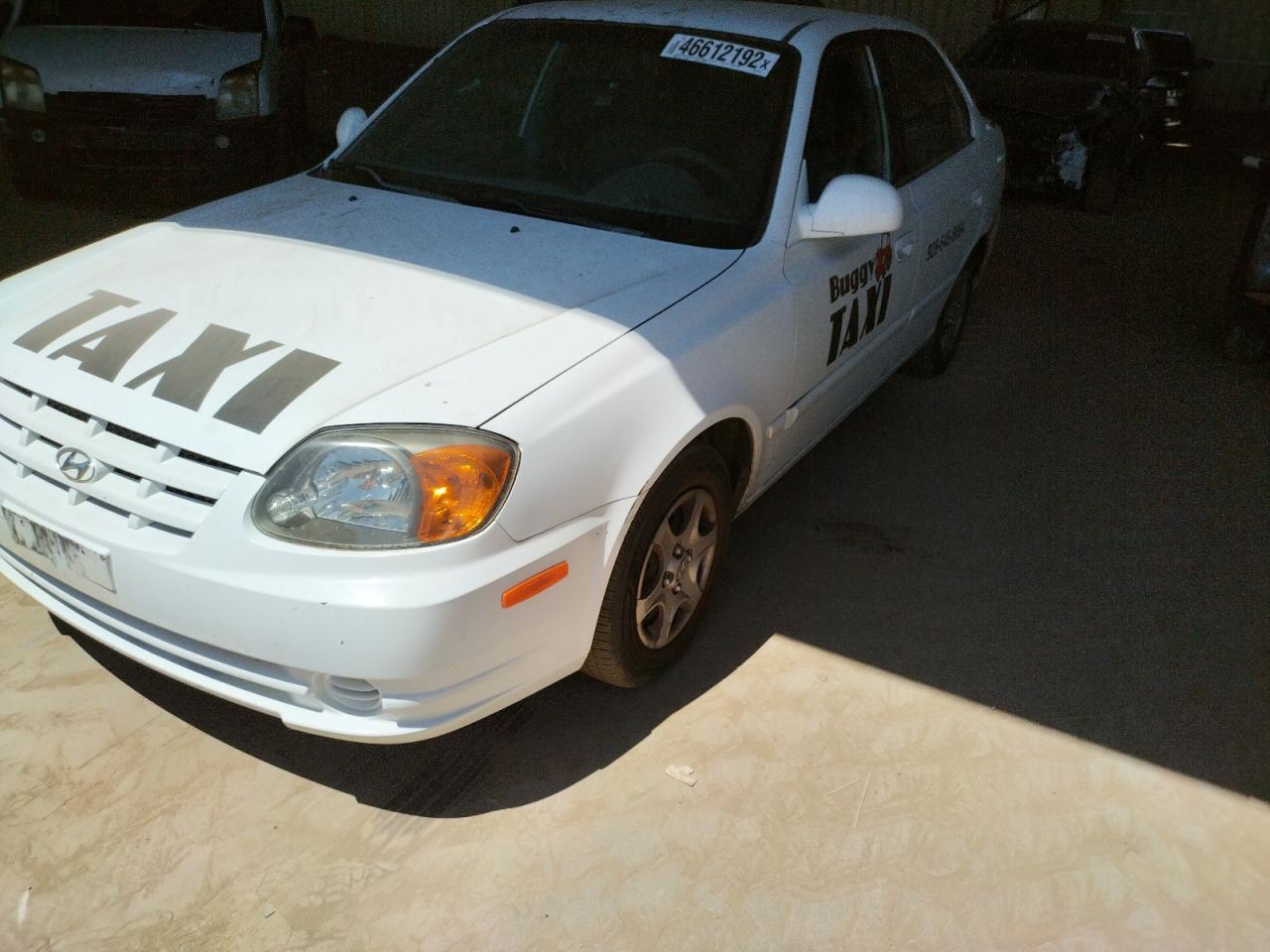 Photo 15 from auction – 2005 HYUNDAI ACCENT GL with VIN KMHCG45C45U575975