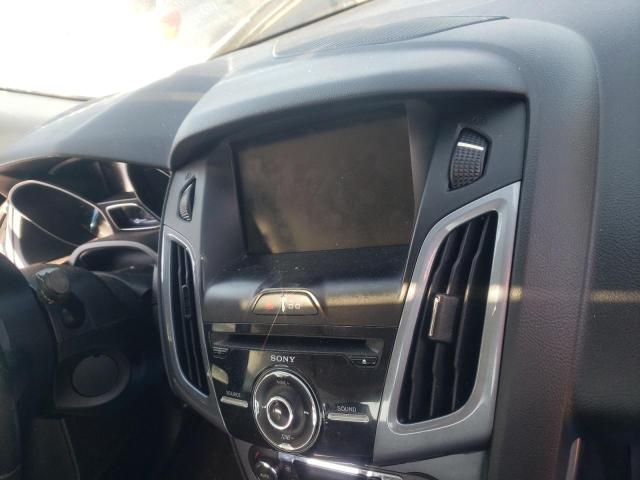 Photo 9 from auction – 2014 FORD FOCUS TITA with VIN 1FADP3J29EL204791