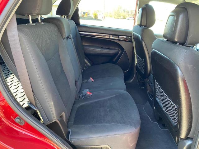 Photo 6 from auction – 2014 KIA SORENTO LX with VIN 5XYKTCA60EG475525