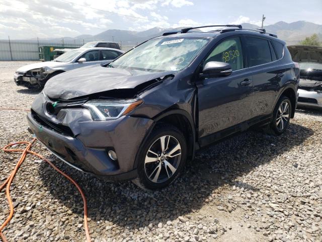 Photo 2 from auction – 2016 TOYOTA RAV4 XLE with VIN JTMRFREV5GJ099627