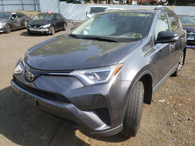 Photo 2 from auction – 2017 TOYOTA RAV4 LE with VIN JTMBFREV3HJ702299