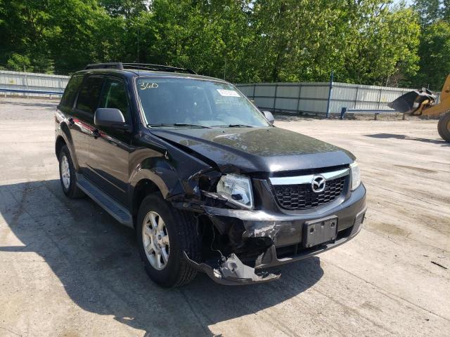 MAZDA TRIBUTE I 2011 with VIN 4F2CY9C7XBKM02456 - Photo from auction