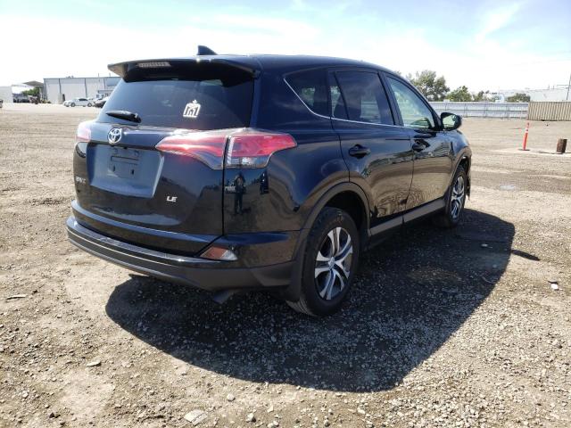 Photo 4 from auction – 2018 TOYOTA RAV4 LE with VIN JTMZFREV0JJ733403