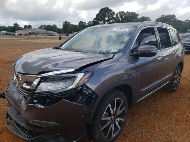 Photo 2 from auction – 2021 HONDA PILOT ELIT with VIN 5FNYF6H08MB089185