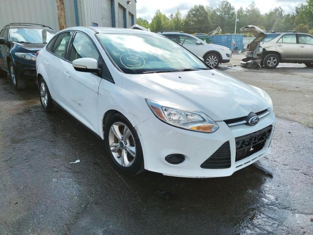 FORD FOCUS SE 2014 with VIN 1FADP3F23EL282024 - Photo from auction