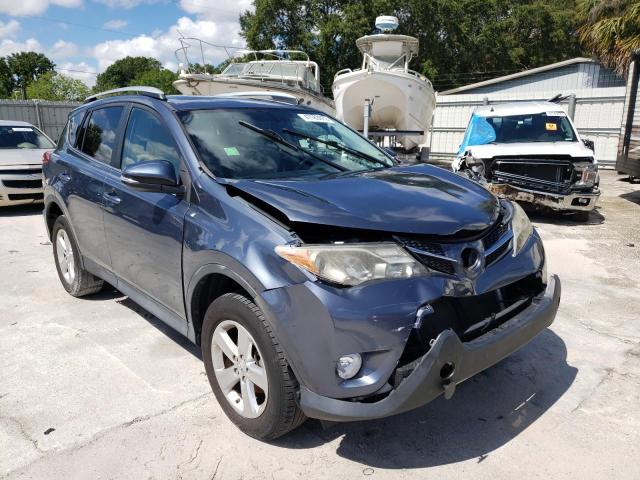 TOYOTA RAV4 XLE 2014 with VIN 2T3WFREV9EW100599 - Photo from auction