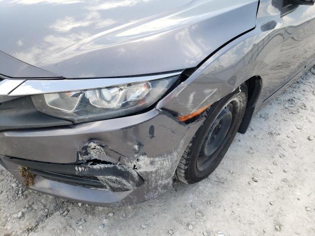 Photo 9 from auction – 2018 HONDA CIVIC LX with VIN 19XFC2F50JE021469