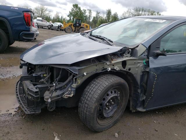 Photo 9 from auction – 2014 TOYOTA COROLLA L with VIN 2T1BURHE5EC128636