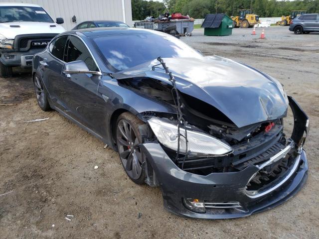 TESLA MODEL S 2014 with VIN 5YJSA1H24EFP63309 - Photo from auction