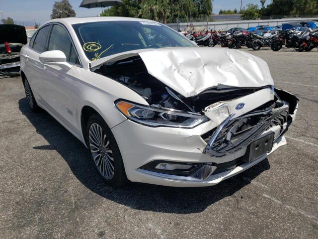 FORD FUSION TIT 2018 with VIN 3FA6P0SU0JR110916 - Photo from auction