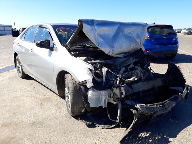 TOYOTA CAMRY LE 2017 with VIN 4T1BF1FKXHU677045 - Photo from auction