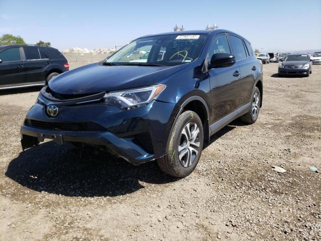 Photo 2 from auction – 2018 TOYOTA RAV4 LE with VIN JTMZFREV0JJ733403