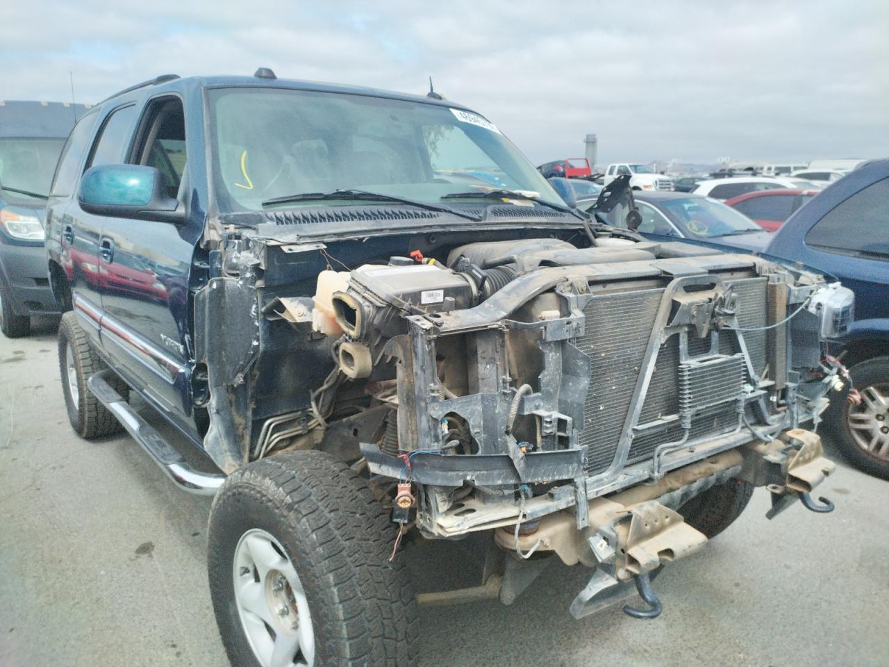Photo 14 from auction – 2005 GMC YUKON with VIN 1GKEK13T65J114974