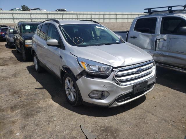 FORD ESCAPE SE 2018 with VIN 1FMCU0G9XJUC64984 - Photo from auction