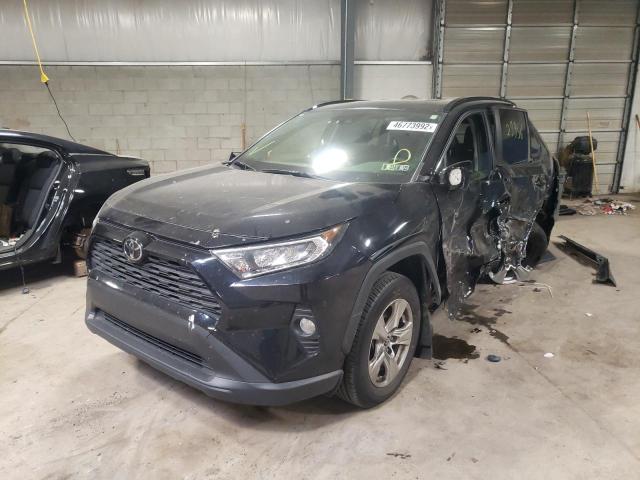 Photo 2 from auction – 2020 TOYOTA RAV4 XLE with VIN JTMP1RFV5LJ028166