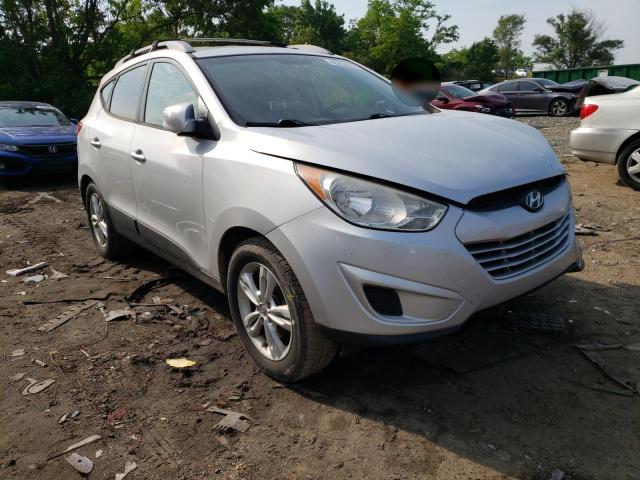 HYUNDAI TUCSON GLS 2012 with VIN KM8JUCAC5CU394641 - Photo from auction