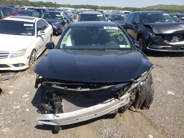 Photo 7 from auction – 2021 TOYOTA CAMRY LE with VIN 4T1C11BK8MU024166