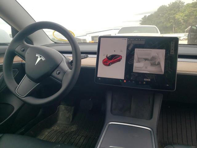 Photo 9 from auction – 2021 TESLA MODEL 3 with VIN 5YJ3E1EA1MF990850