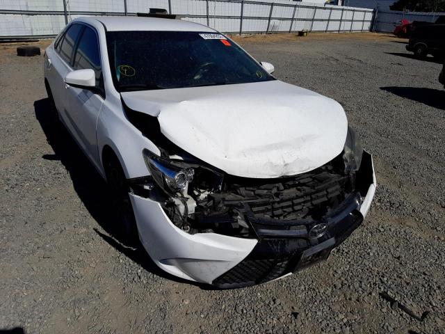 TOYOTA CAMRY LE 2016 with VIN 4T1BF1FK7GU144035 - Photo from auction