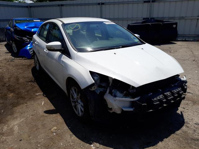 FORD FOCUS SE 2016 with VIN 1FADP3F21GL269310 - Photo from auction