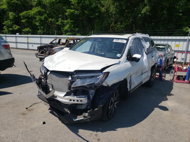 Photo 2 from auction – 2021 HONDA PILOT TOUR with VIN 5FNYF6H69MB042073