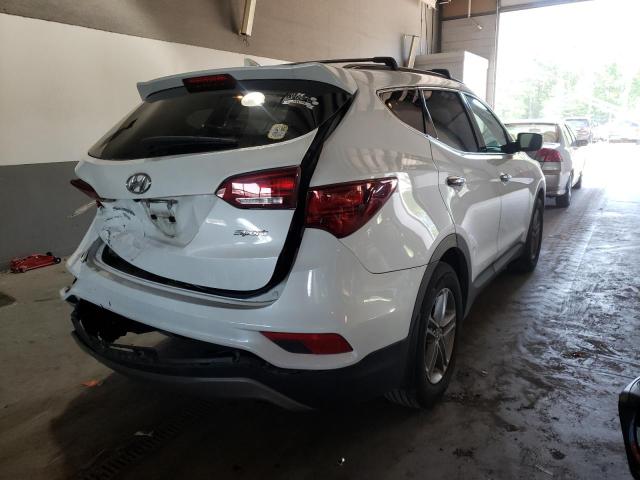 Photo 4 from auction – 2018 HYUNDAI SANTA FE S with VIN 5NMZU3LB0JH070481