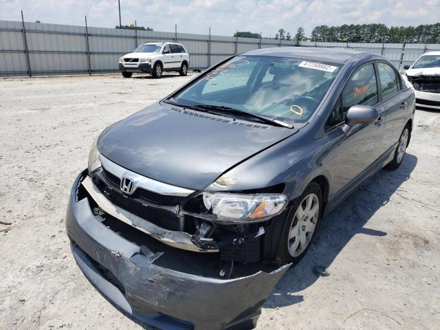 Photo 2 from auction – 2011 HONDA CIVIC LX with VIN 19XFA1F5XBE041777