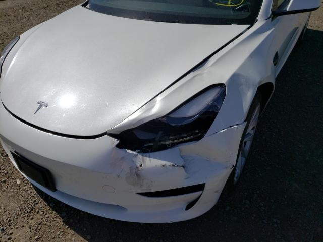 Photo 9 from auction – 2022 TESLA MODEL 3 with VIN 5YJ3E1EB4NF145579